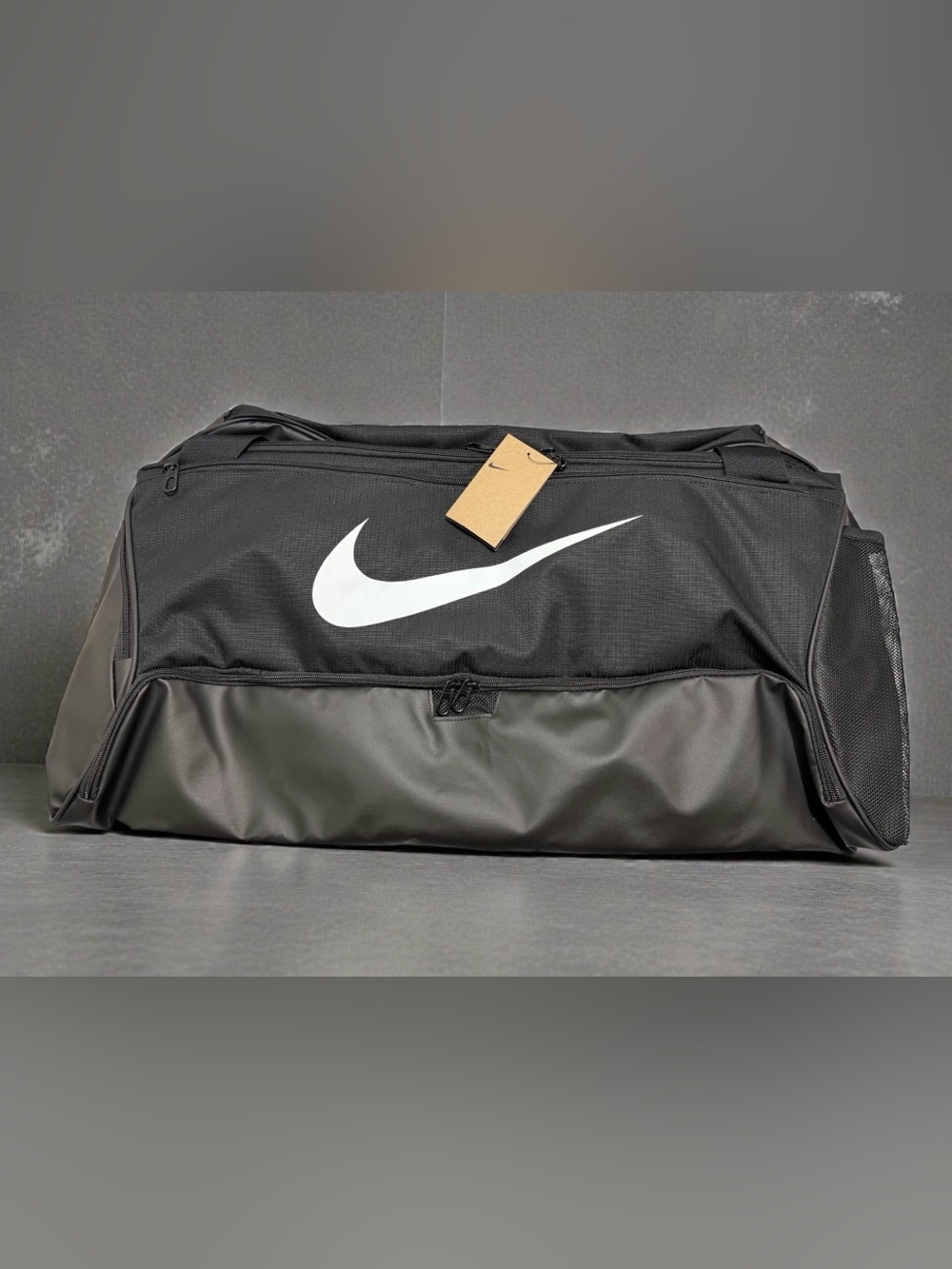Nike Black Duffel Bag with White Swoosh 95 liter